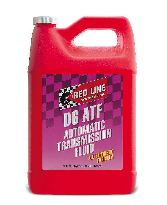 Red Line D6 ATF gear oil gallon container with label, designed for automatic transmissions and gear systems.