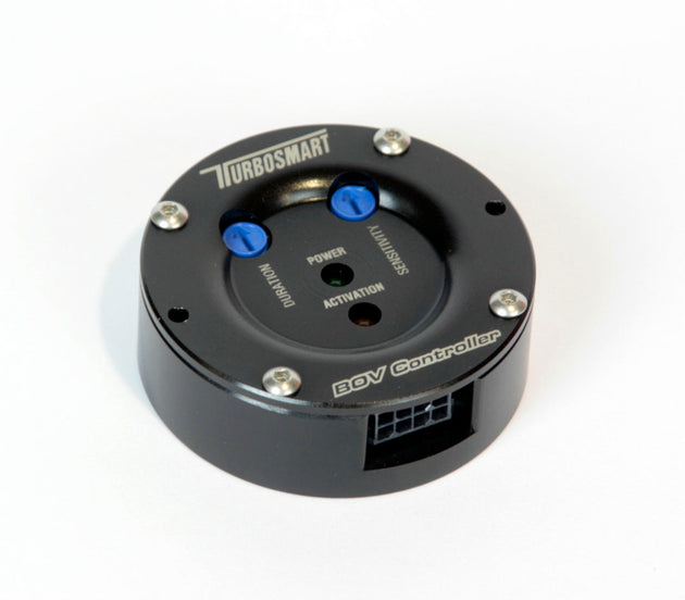 Turbosmart BOV controller kit in black, boost controller with hardware components, designed for managing turbo boost pressure.