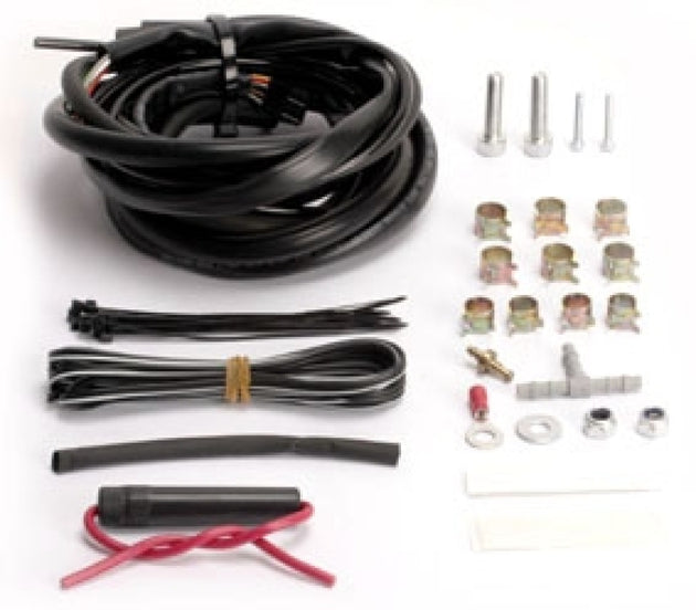 Turbosmart eB2 Re-loom kit for boost controller accessories, showing neatly organized wiring components and connectors.