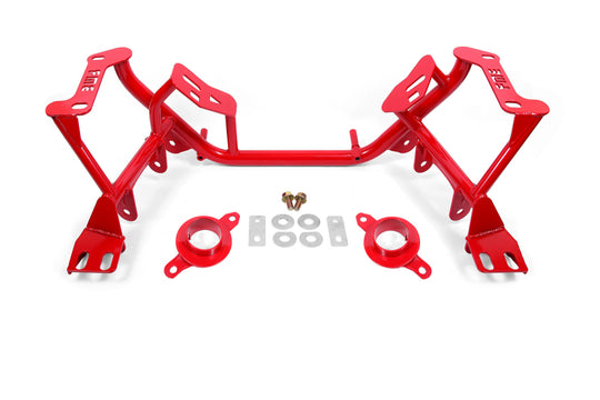 Red BMR Suspension K-Member crossmember for 96-04 Ford Mustang with spring perches, designed for improved chassis support.