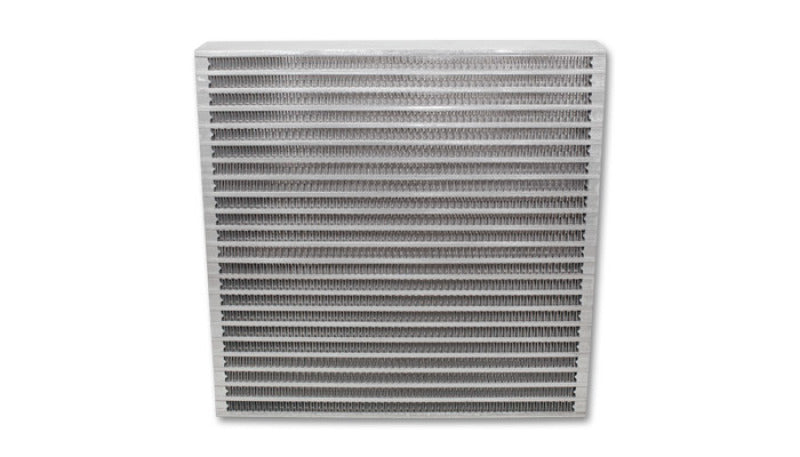 Vibrant universal oil cooler core, 12x12x2 inches, with metal fins and fittings, designed for efficient engine oil cooling.