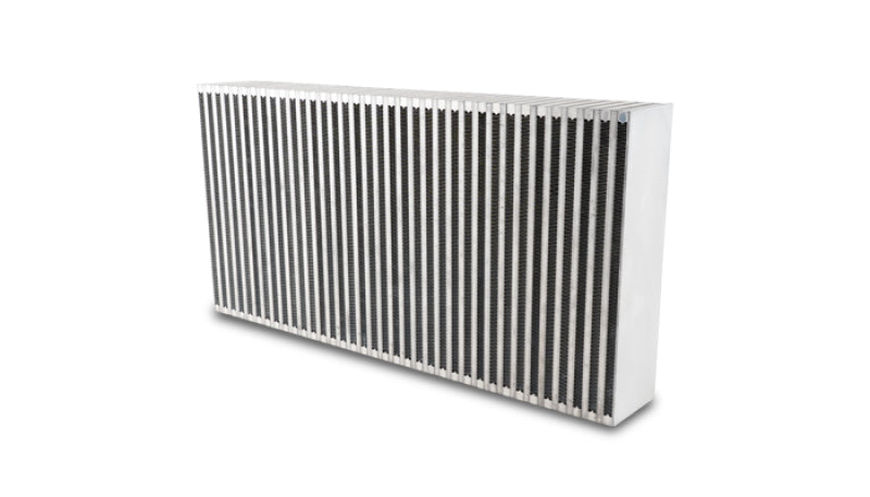 Vibrant vertical flow intercooler core with 24-inch width, 12-inch height, and 3.5-inch thickness showing metal fins and end tanks.