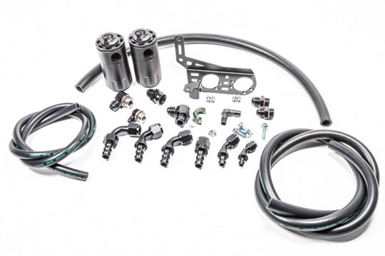 Radium Engineering Dual Catch Can Kit Gallardo LP Fluid Lock oil catch cans installed in a vehicle engine bay.