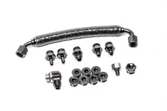 Radium Engineering fuel rail plumbing for Audi R8 and Lamborghini Huracan, showing polished metal fuel rails and fittings.