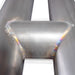 Stainless Works 18-21 Mustang GT mid resonator delete H-pipe connecting pipes installed in a vehicle's exhaust system