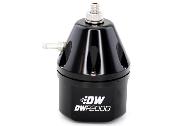DeatschWerks DWR2000 black adjustable fuel pressure regulator with inlet and outlet ports for automotive fuel systems.