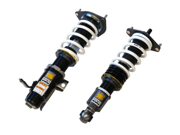 HKS Hipermax S ZD8 coilover kit installed on a Subaru BRZ, showcasing adjustable suspension components and sleek design.