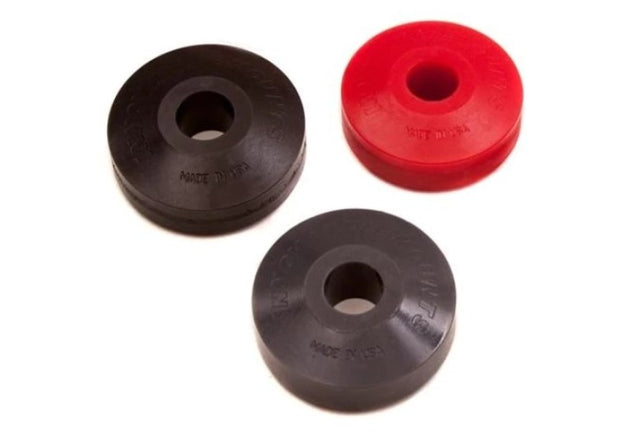 Pair of Innovative 75A replacement engine mount bushings for Innovative Mounts kits, shown in black with metal inserts.