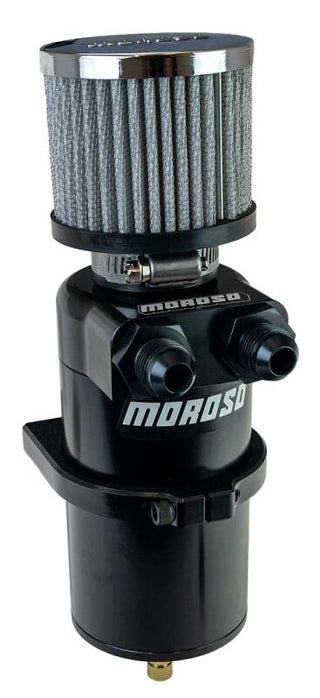 Moroso black dual inlet -8AN billet oil catch can with breather tank for automotive engine ventilation system.