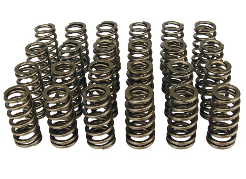 COMP Cams beehive valve springs and retainers, 1.185-inch diameter, designed for high-performance engine valve operation.