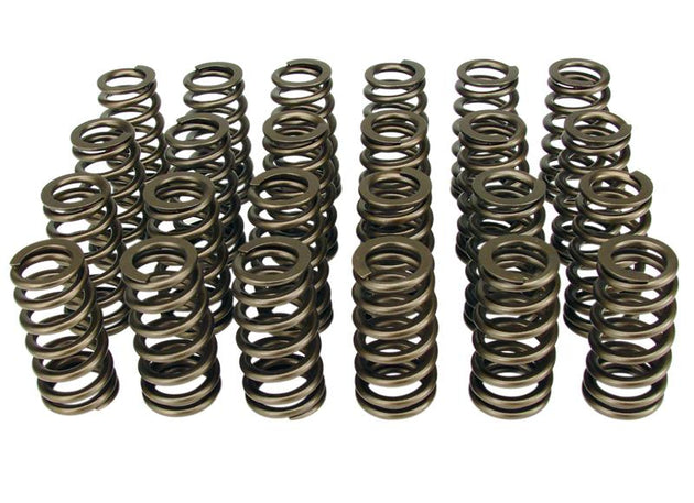 High-performance COMP Cams valve springs and retainers for engine valve operation, showcasing metal springs and retainers.