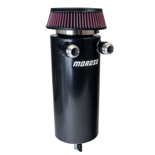 Moroso black aluminum oil catch can with dual -16AN inlet, 6-inch diameter, designed for automotive engine ventilation.
