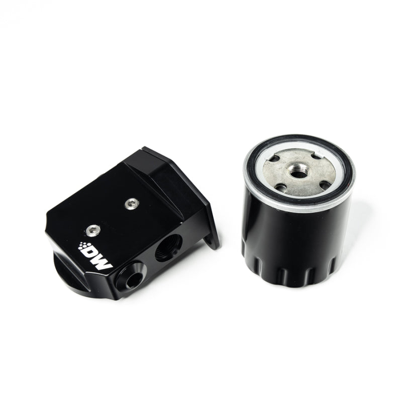DeatschWerks universal spin-on fuel filter kit with 5 micron filter for E85 fuel, designed for easy installation and filtration.