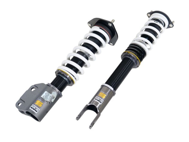 HKS HIPERMAX S CT9A coilover kit with adjustable shocks and springs installed on a car suspension system.