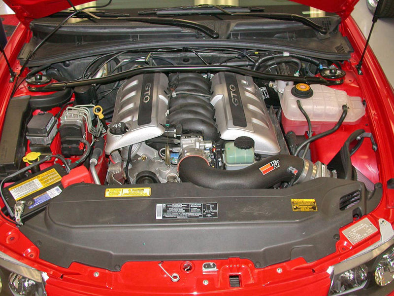 K&N Engineering cold air intake kit for 2004 Pontiac GTO 5.7L V8 engine, with air filters and intake hoses visible in the image
