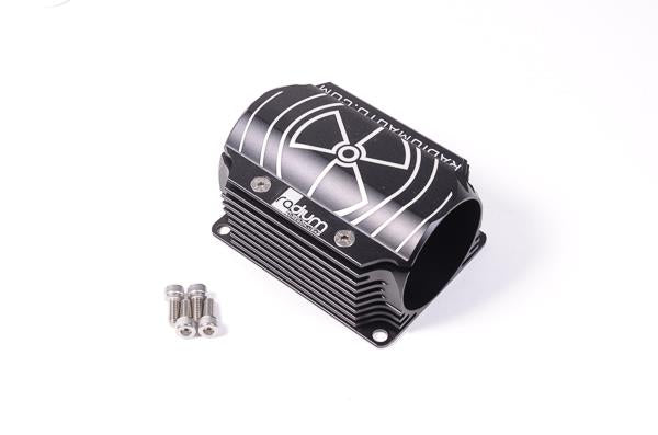 Radium Engineering fuel filter with 60mm clamp and heat exchanger, shown mounted on automotive engine component.
