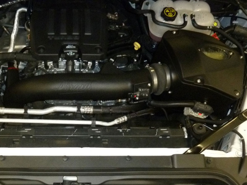 Airaid Chevrolet Silverado 1500 L4 cold air intake system with Synthamax filter, showcasing the black intake tube and air filter.