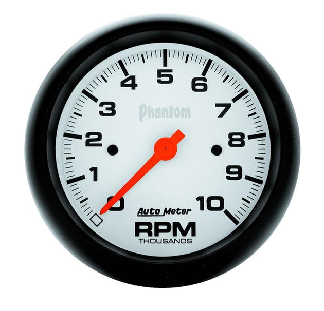 AutoMeter Phantom 52mm mechanical oil pressure gauge showing a black dial with white markings and a silver bezel.