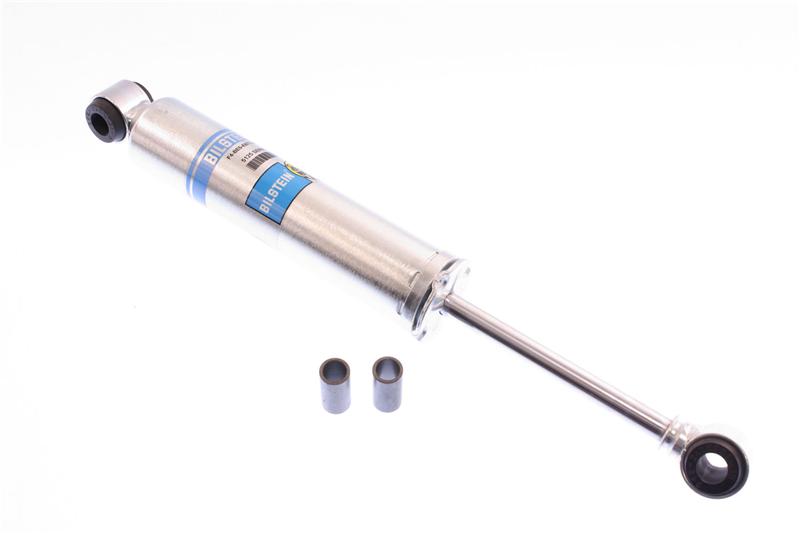 Bilstein 5100 Series lifted truck shock absorber with 46mm monotube design, mounted on a lifted truck suspension.