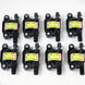 Set of 8 Granatelli Motor Sports LS1-LS9 ignition coils in black for GM LS engine upgrades, high-performance automotive parts.