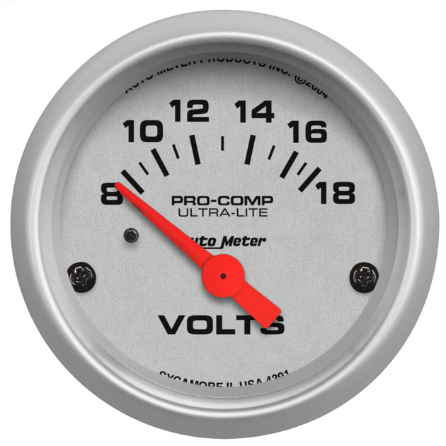 AutoMeter Ultra-Lite 52mm short sweep electronic voltage gauge displaying a clear digital readout in a vehicle dashboard.