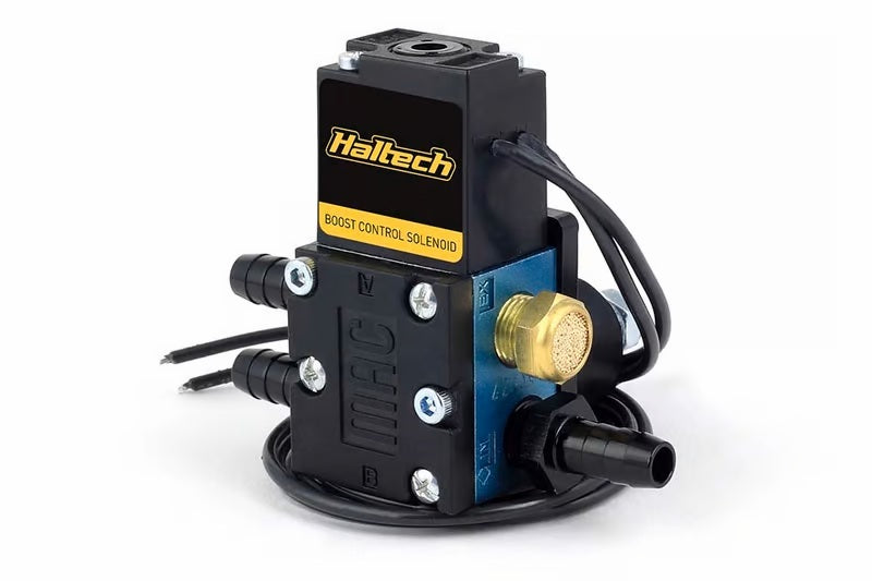 Haltech 4-port boost control solenoid with 1/8 inch NPT fittings, designed for precise boost management in automotive applications.