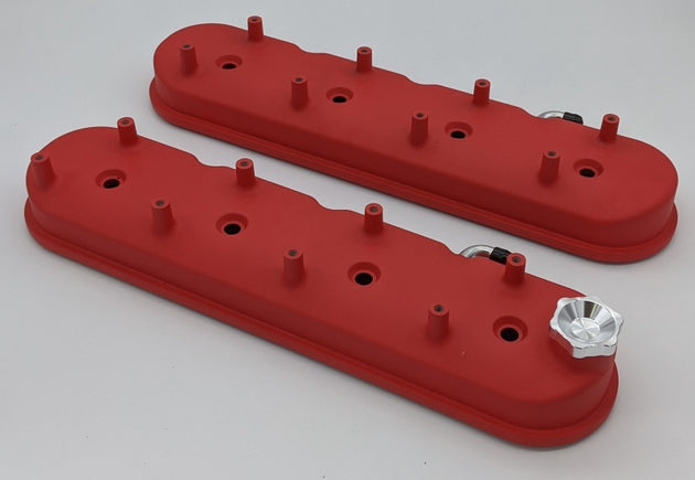 Pair of Granatelli Motor Sports GM LS tall valve covers with red wrinkle finish and integral angled coil mounts.