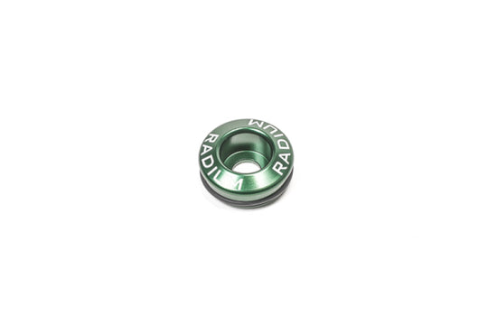 Radium Engineering Nissan fuel injector seat adapter, 25mm size, designed for precise engine tuning and injector fitting.