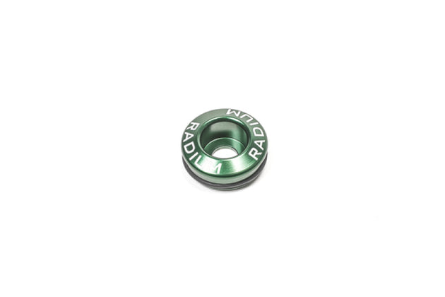 Radium Engineering Nissan fuel injector seat adapter, 25mm size, designed for precise engine tuning and injector fitting.