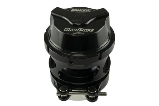 Turbosmart GenV ProPort Universal 54mm Blow Off Valve installed on a turbocharged engine, showcasing its sleek design and brand logo.