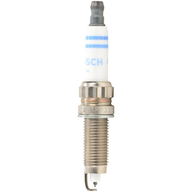 Bosch suppressed spark plug ZR5TPP33 showing metal shell and ceramic insulator for automotive ignition systems