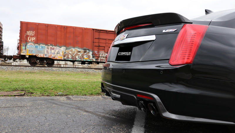 Polished CORSA Performance axle-back exhaust for Cadillac CTS V 2016-2019 with 6.2L V8 engine, featuring dual exhaust tips.