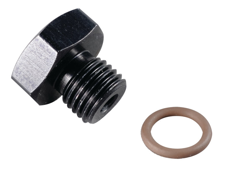 Fragola -6AN black port plug with 9/16-18 thread for fuel or fluid fittings, shown in close-up.