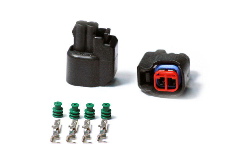 Injector Dynamics Universal Fuel USCAR Injector Female Connector Kit showing detailed black plastic connectors for fuel injectors.