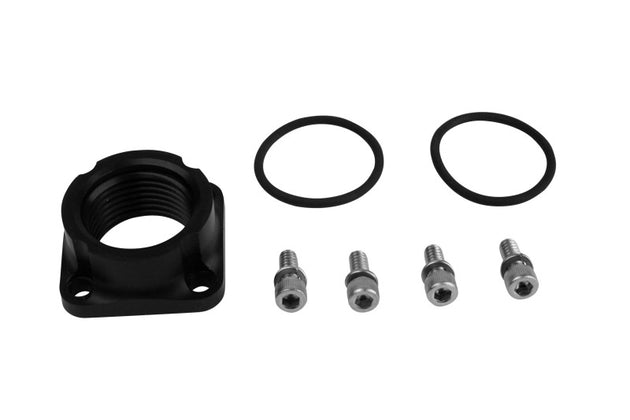 Aeromotive AN-12 female port adapter fitting for fuel lines, shown with detailed metal construction and threading.