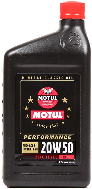 Motul 1L Classic Break-In Oil 10W40 bottle for motor engines with label showing product details and branding.
