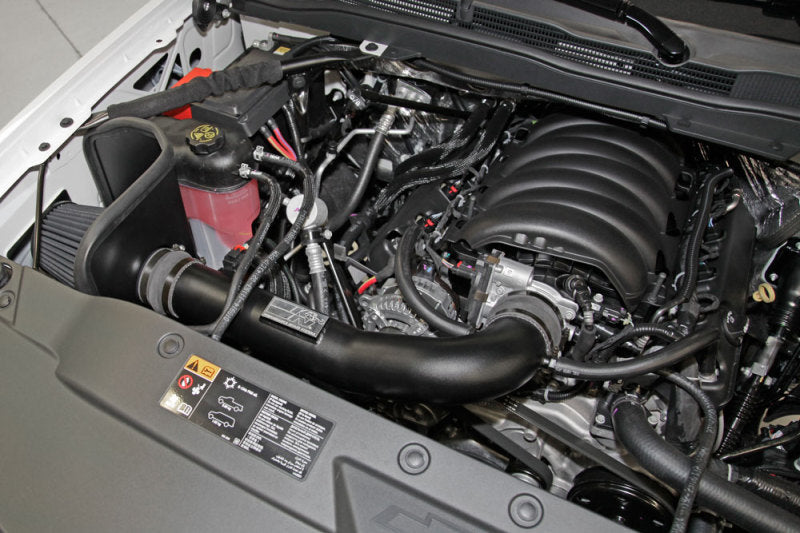 K&N 71 Series Performance Cold Air Intake Kit installed in Chevrolet Silverado, GMC Sierra 2014-2015, showing the intake tube and filter.