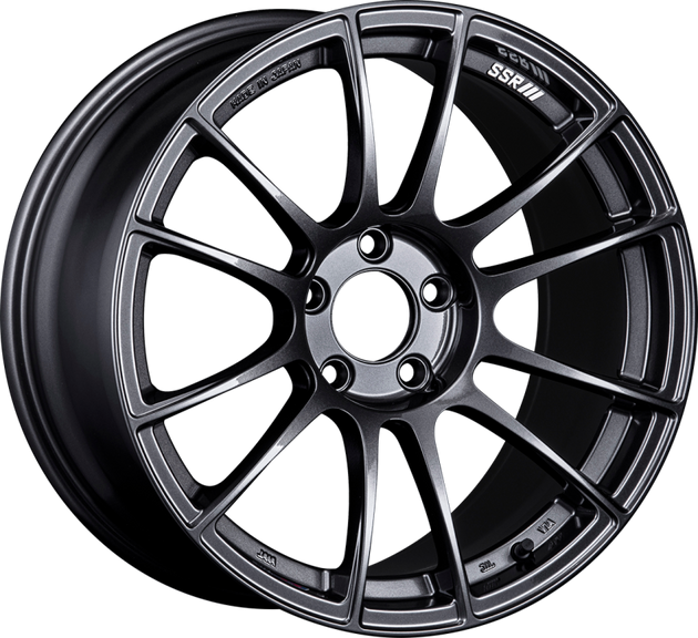 SSR GTX04 18x9.5 cast wheel with 5x114.3 bolt pattern and 22mm offset in dark gunmetal finish, shown from a side view.