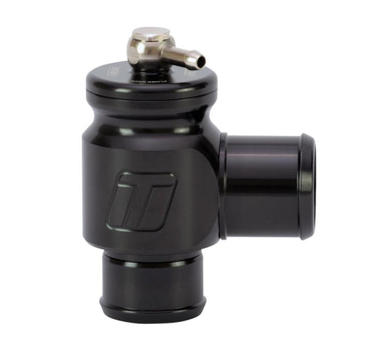 Turbosmart Kompact Plumb Back 34mm Blow Off Valve installed on a turbocharged engine, with polished metal and black components visible