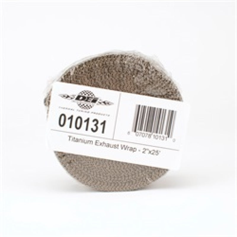 DEI Titanium Exhaust Wrap 2in x 25ft wrapped around automotive exhaust pipe, heat-resistant exhaust insulation material.