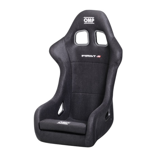 Black OMP First Series racing seat with ergonomic design and supportive padding, ideal for motorsport enthusiasts.
