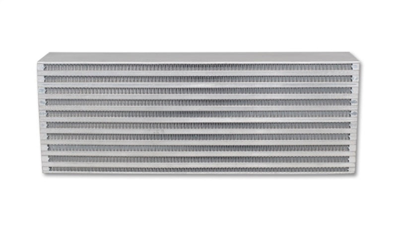 Vibrant air-to-air intercooler core with 18x6.5x3.25 inch dimensions, featuring aluminum fins and end tanks for turbocharged vehicles.