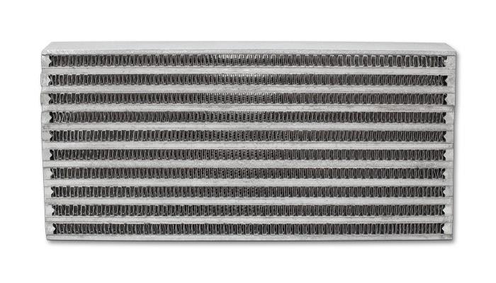 Vibrant universal oil cooler core measuring 6x10x2 inches, with aluminum fins and fittings for efficient engine oil cooling.