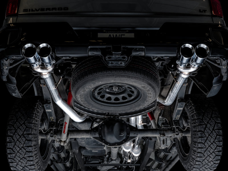 AWE Tuning 4th Gen GM 1500 6.2L catback exhaust with split rear exit and quad chrome tips, featuring bumper cutouts.