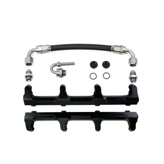 DeatschWerks Chevrolet LSA/LS9 fuel rails with crossover installed on engine, showing polished metal finish and mounting points