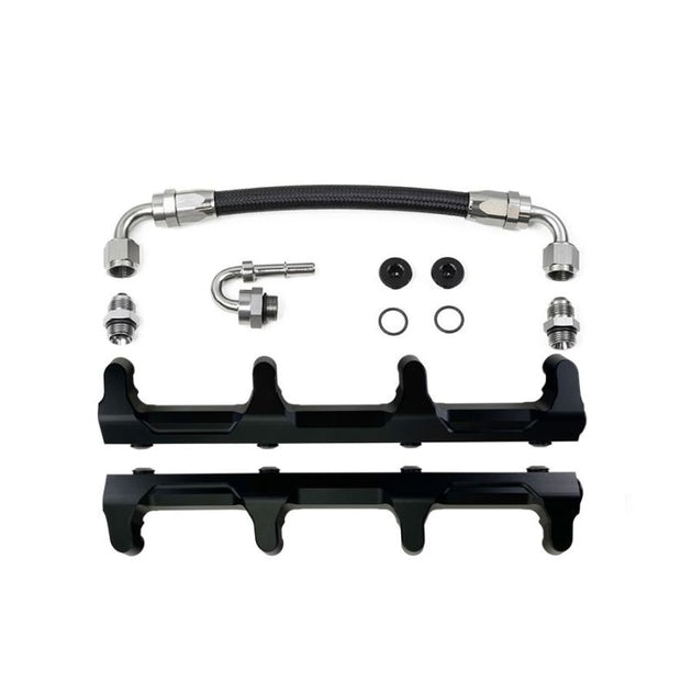 DeatschWerks Chevrolet LSA/LS9 fuel rails with crossover installed on engine, showing polished metal finish and mounting points