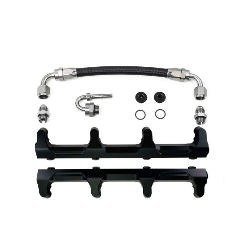 DeatschWerks Chevrolet LSA/LS9 fuel rails with crossover installed on engine, showing polished metal finish and mounting points