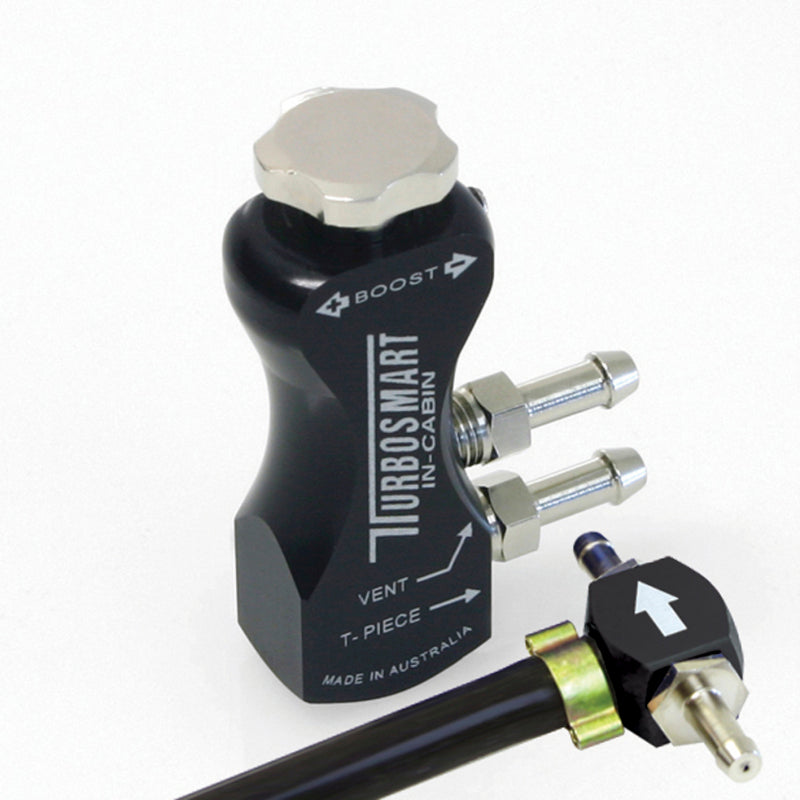 Turbosmart GBCV In-Cabin Black boost controller mounted in vehicle interior with control knob and display.