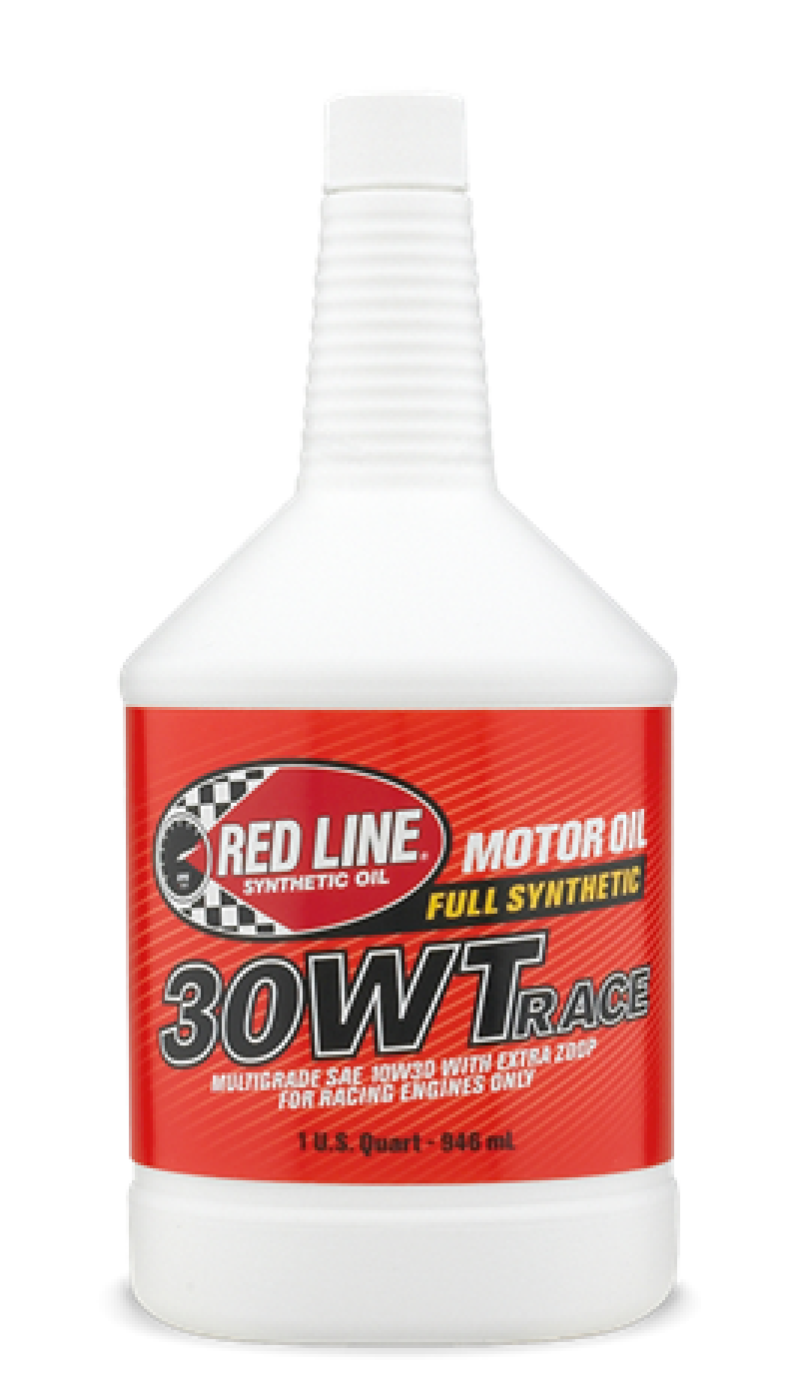 Red Line 30WT Race Oil quart bottle, high-performance motor oil for racing engines, with a red label and oil cap visible.