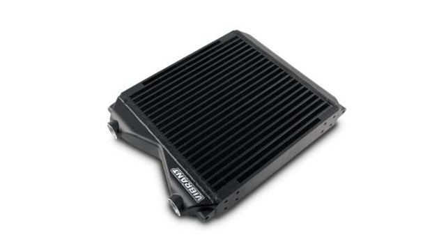 Vibrant double pass 12x12x2-inch oil cooler assembly with vibrant cooling fins and fittings for automotive use.